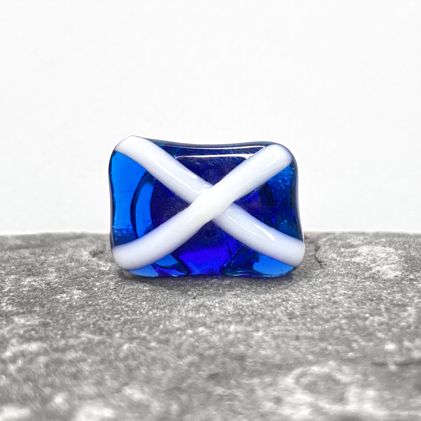 Satire Glass Pin Badge